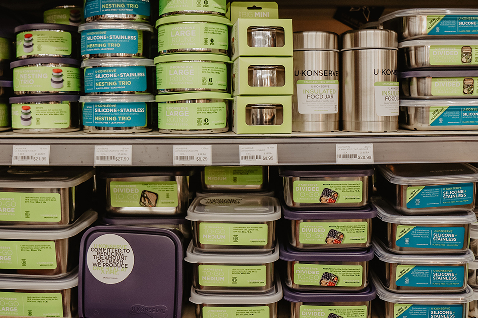 reusable containers on a shelf in the farm store